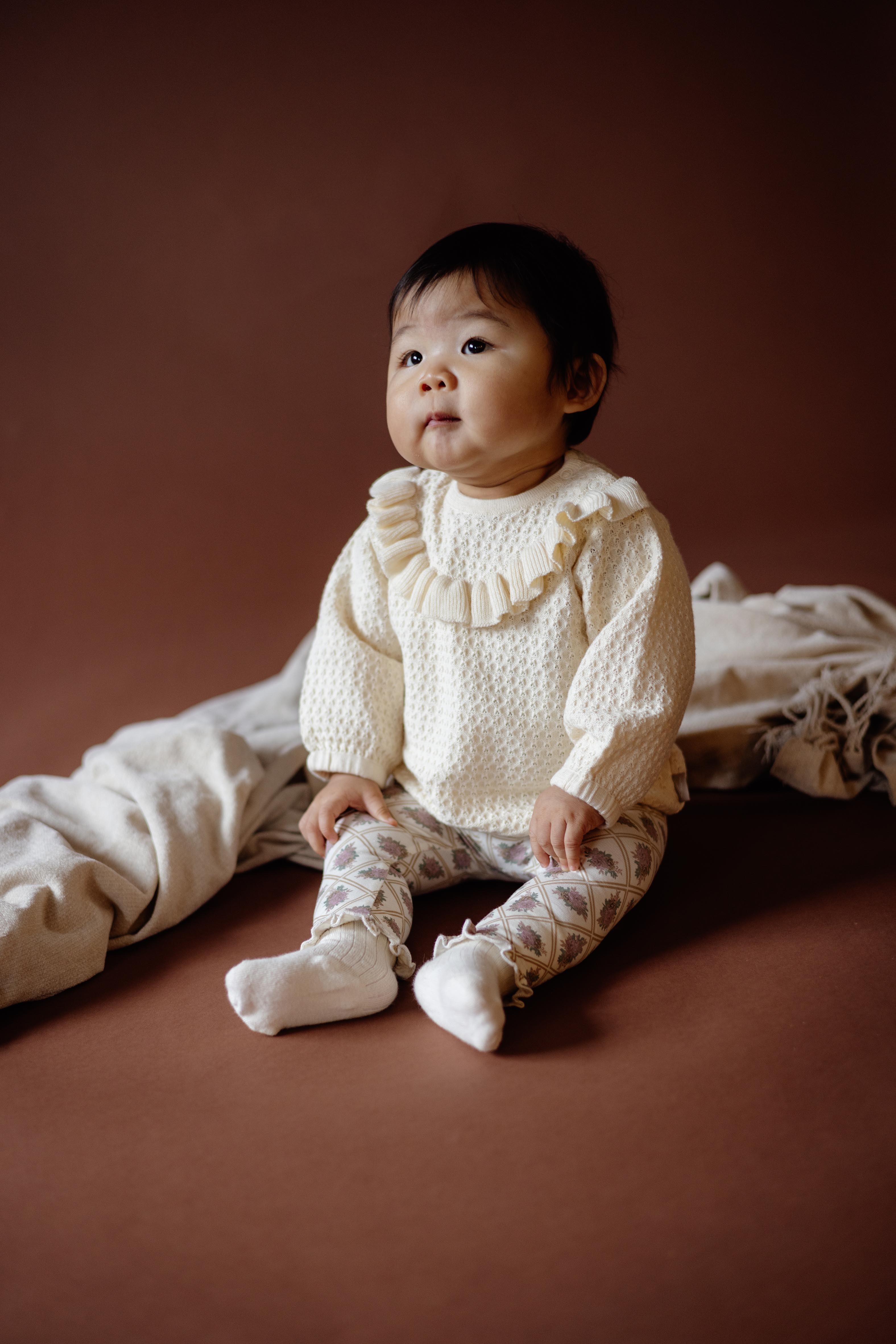 Crèmekleurige sweater met ruchekraag | White Cream