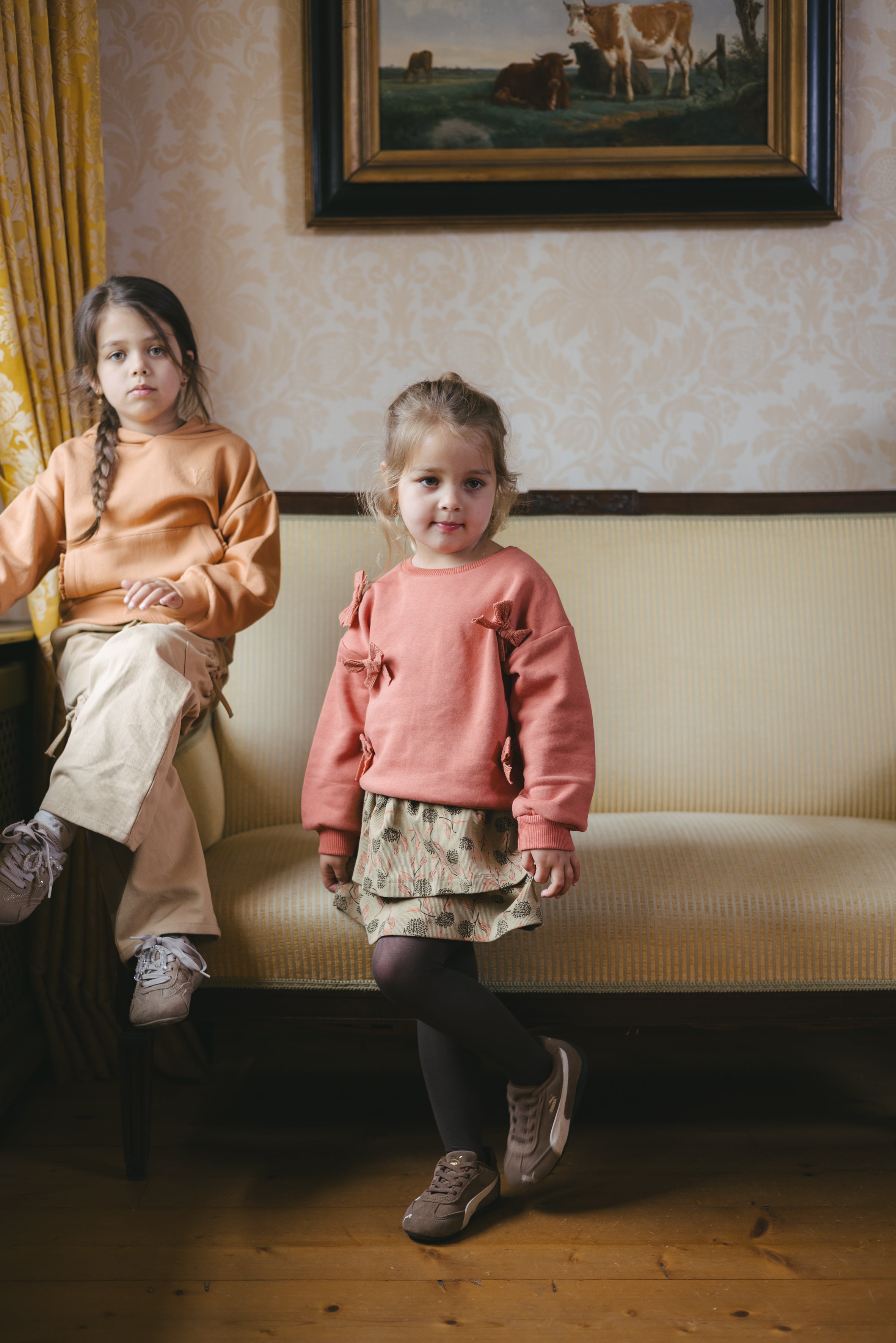 Koraalroze sweater met strikken | Coral